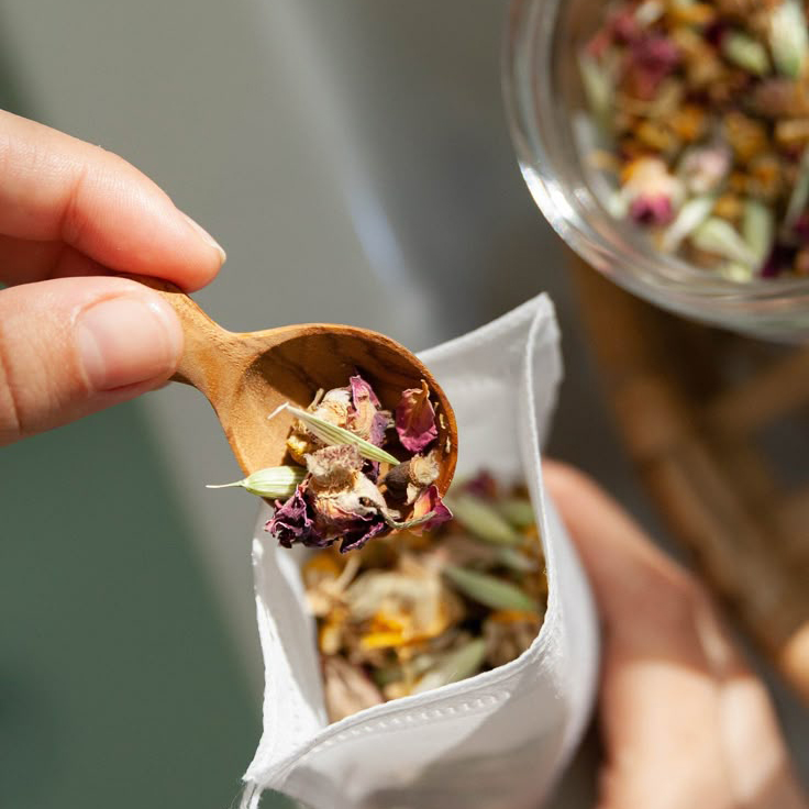 Placing tea into cup